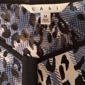 CAbi Animal Print Blouse in Black, White, and Blue
